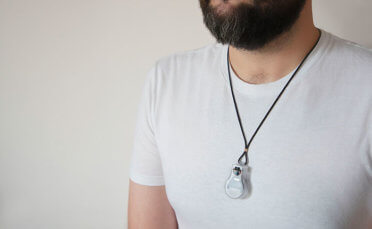 PULSE Pendant designed by NASA's Jet Propulsion Laboratory to remind the wearer not to touch their face.