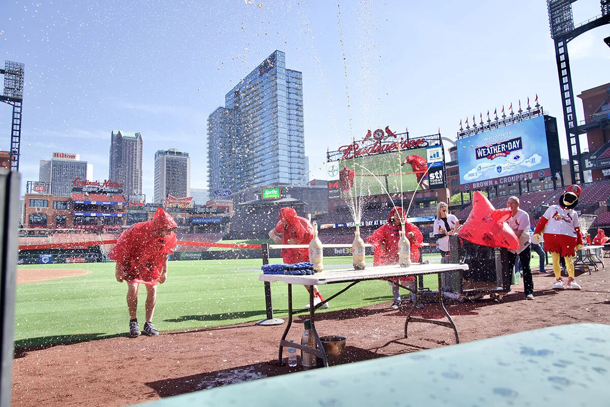 Science Center celebrates Weather Day at the Ball Park with St. Louis Cardinals baseball players conducting a presentation using soda and Mentos to create a geyser explosion