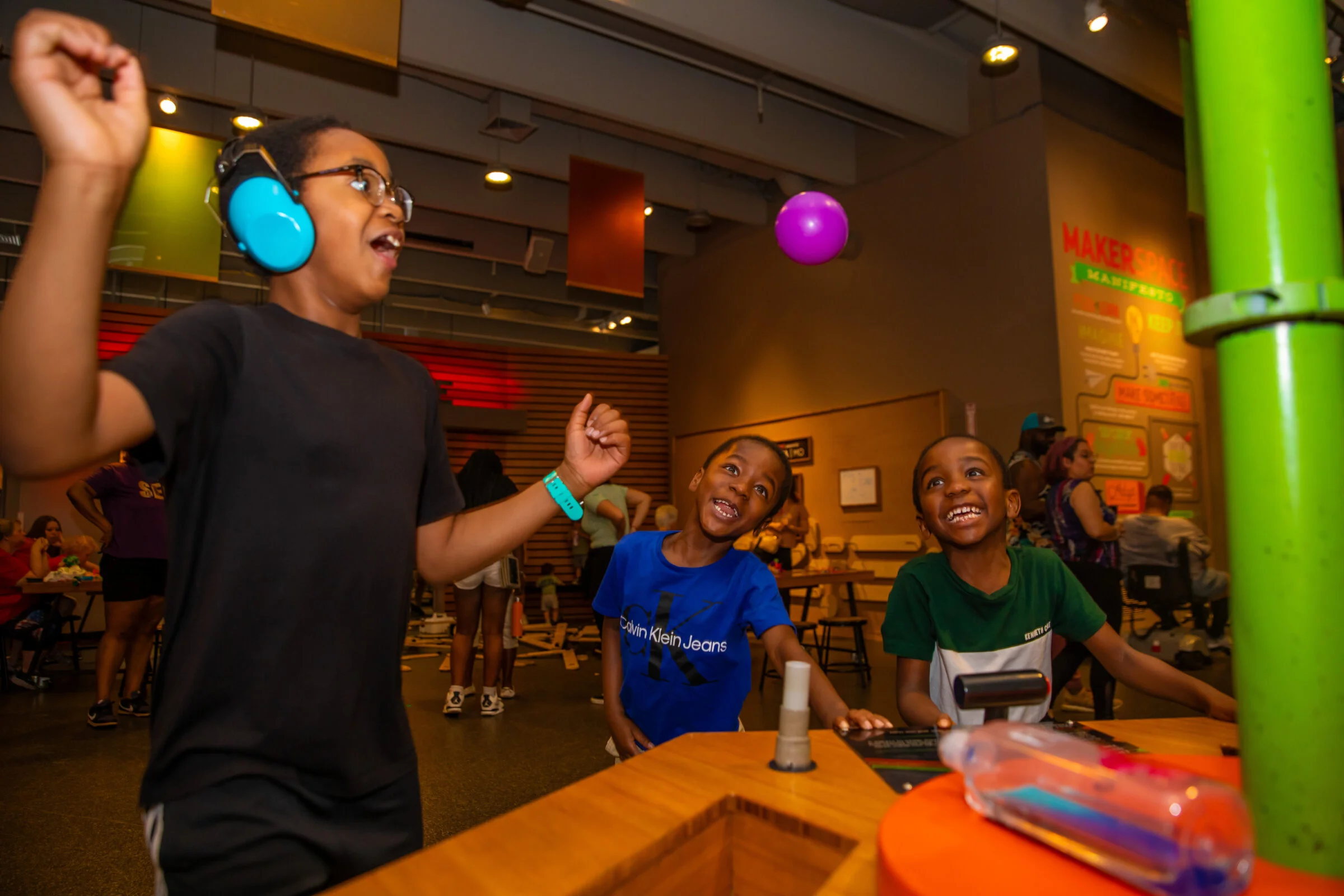 Three young boys in Makerspace